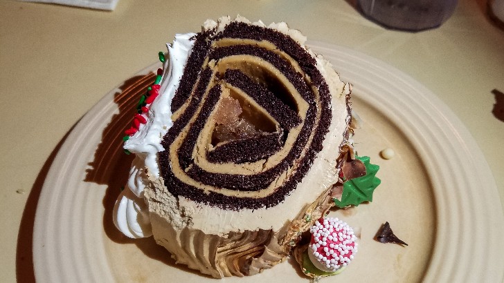 What Is The English Name For The Popular Traditional French Christmas Dessert Made From A Sponge Cake That Is A Type Of Sweet Roulade Known As Buche De Noel In French