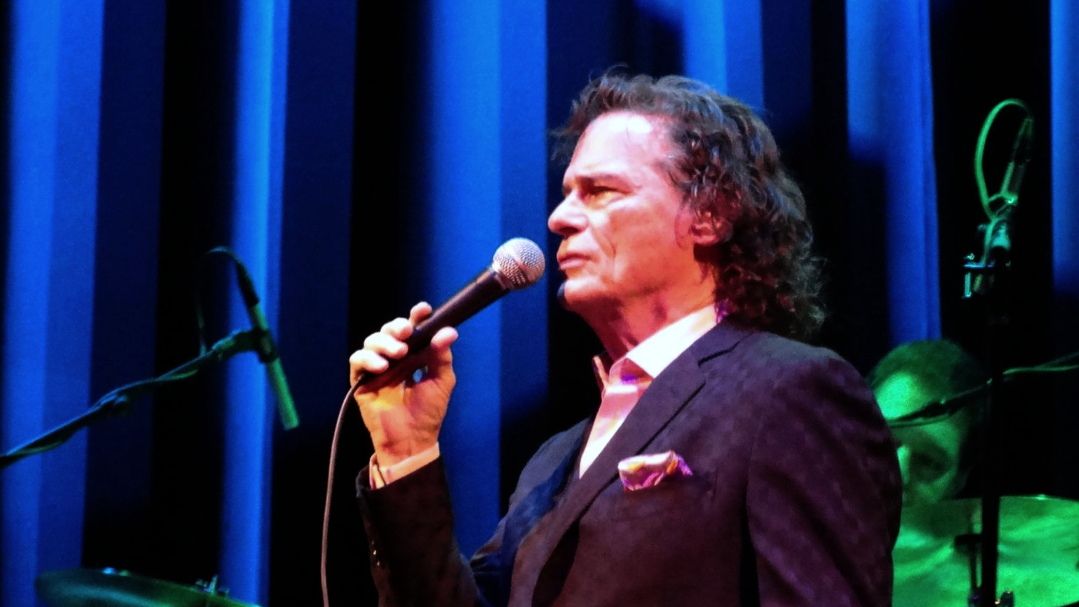 First airing in 1985, what theme song was performed by B.J